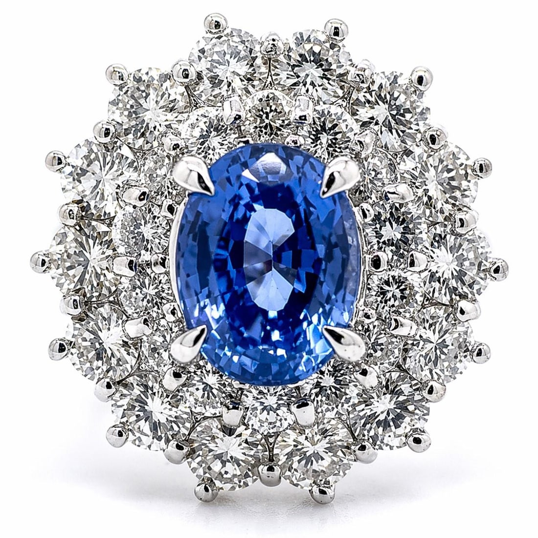 Sapphire and Diamond Platinum Ring with 1.84 Carat Center Stone: Sapphire and Diamond Platinum Ring with 1.84 Carat Center Stone This pre-owned ring features a 1.84 carat sapphire set in platinum, accented by 28 diamonds with a total weight of 1.69 carats. The diam