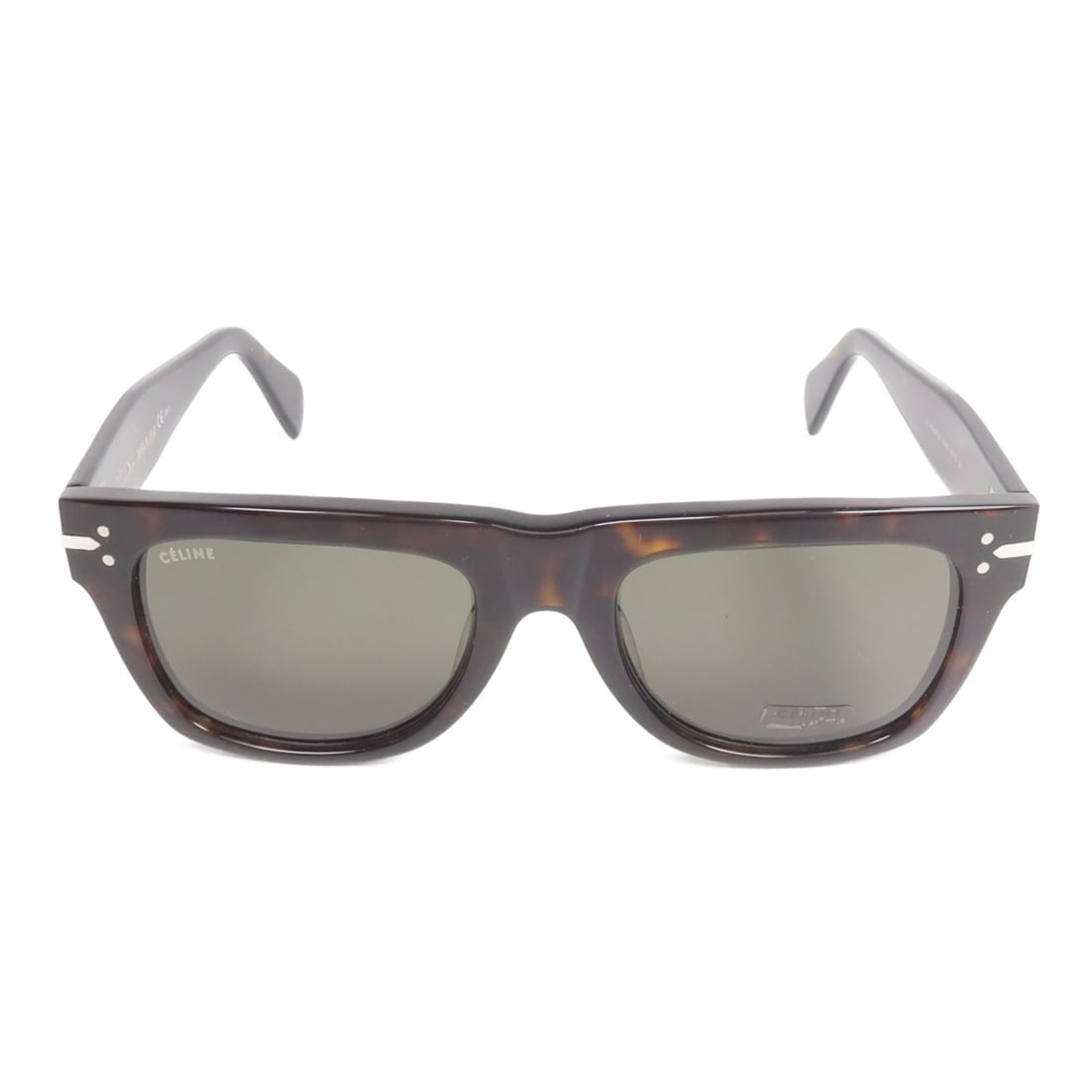 CELINE Women's Black PVC Sunglasses France: CELINE Women's Black PVC Sunglasses France These CELINE sunglasses feature a black PVC frame with brown lenses, offering a stylish accessory for women. Manufactured in France, they present a very good