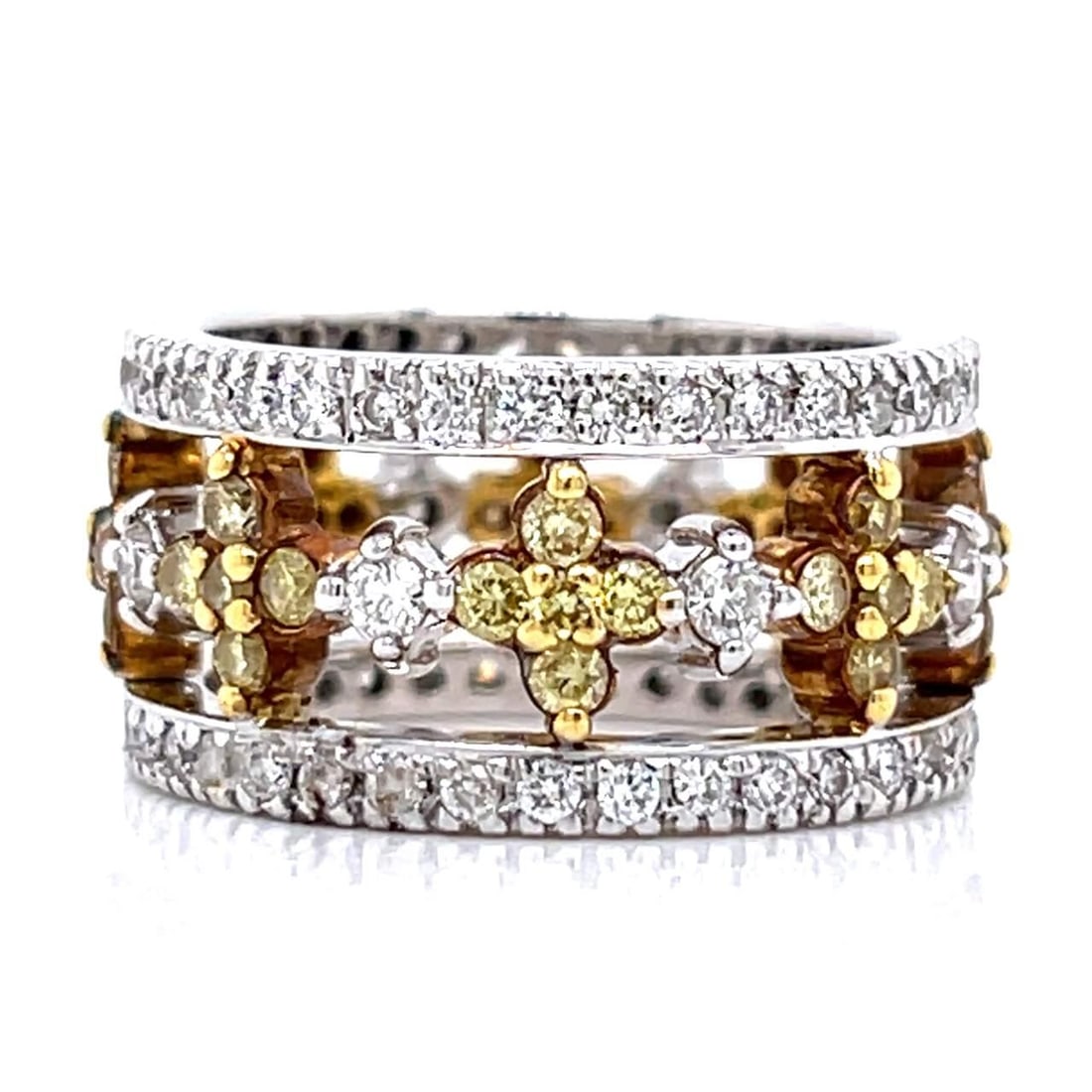 18K White Gold Fancy Yellow Diamond Ring 1.20 Ct VVS Clarity: 18K White Gold Fancy Yellow Diamond Ring 1.20 Ct VVS Clarity This exquisite 18K White Gold Fancy Yellow Diamond Band features a stunning array of 40 Fancy Intense Yellow Diamonds totaling approximatel