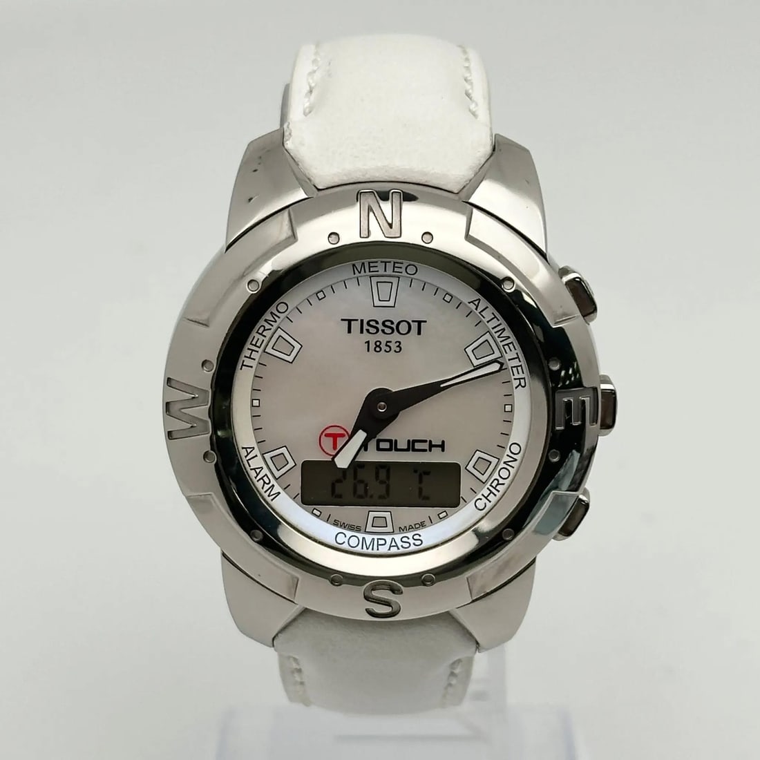 Tissot T-Touch Ladies Quartz Watch Mother of Pearl Dial T33.7.658.81: Tissot T-Touch Ladies Quartz Watch Mother of Pearl Dial T33.7.658.81 The Tissot T-Touch is a stylish and functional wristwatch designed for ladies, featuring a stunning Mother of Pearl dial. This vers