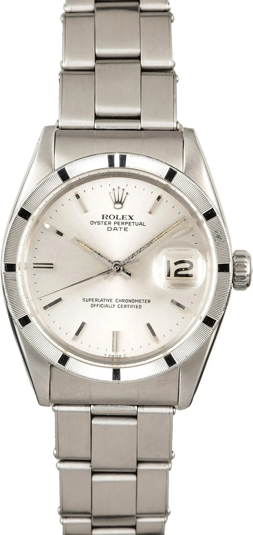 Rolex Oyster Perpetual Date 1501 Silver Index Dial Oyster Bracelet: Rolex Oyster Perpetual Date 1501 Silver Index Dial Oyster Bracelet This Rolex Oyster Perpetual Date features a silver index dial and an engine-turned bezel, complemented by the classic Oyster bracelet