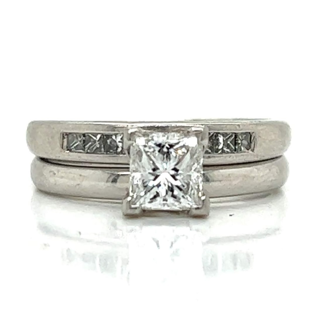 GIA Certified Platinum Diamond Ring Band Set 0.75 Ct Princess-Cut: GIA Certified Platinum Diamond Ring Band Set 0.75 Ct Princess-Cut This exquisite Platinum Diamond Ring & Band Set features a stunning GIA Certified 0.75 Ct. princess-cut diamond at its center, surroun