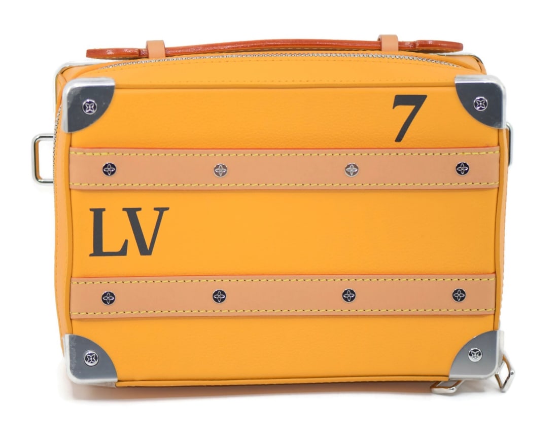 Louis Vuitton Virgil Handle Soft Trunk Bag M59669 Orange Leather Messenger: Louis Vuitton Virgil Handle Soft Trunk Bag M59669 Orange Leather Messenger Introducing the Louis Vuitton Virgil Handle Soft Trunk Bag, a stunning accessory that combines luxury with practicality. This
