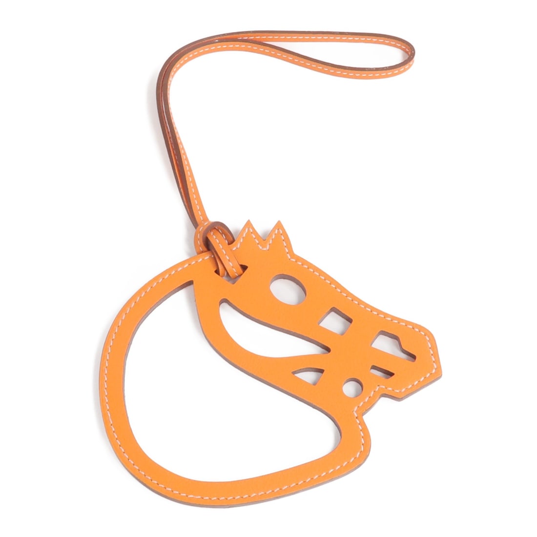 Paddock Cheval Orange Calfskin Bag Charm by Hermes: Paddock Cheval Orange Calfskin Bag Charm by Hermes This Hermes Paddock Cheval bag charm is crafted from orange Vaux Swift calfskin leather. Designed for a unisex audience, it features a horse motif an