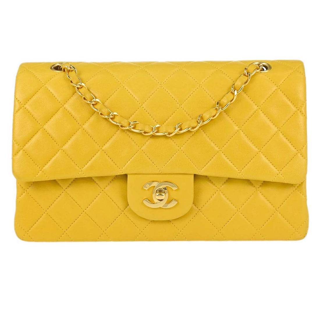 CHANEL Classic Double Flap Yellow Lambskin Shoulder Bag Medium: CHANEL Classic Double Flap Yellow Lambskin Shoulder Bag Medium This Chanel Medium Classic Double Flap Shoulder Bag is crafted from yellow lambskin leather and features a turn lock closure. Designed wi