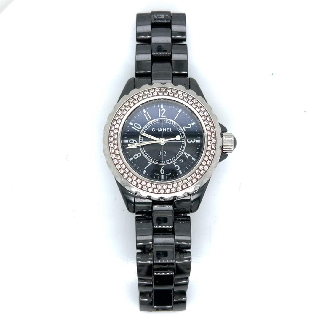 CHANEL J-12 Black Ceramic Quartz Watch 33mm Diamond Bezel: CHANEL J-12 Black Ceramic Quartz Watch 33mm Diamond Bezel This CHANEL J-12 ladies watch features a 33mm black ceramic case and a factory diamond bezel for a sophisticated look. Powered by a quartz mov