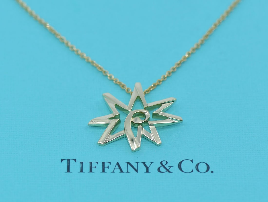 Paloma Picasso Star Pendant Necklace 18K Yellow Gold by Tiffany & Co: Paloma Picasso Star Pendant Necklace 18K Yellow Gold by Tiffany & Co This Tiffany & Co. Paloma Picasso Star necklace is crafted from 18k yellow gold and features a pendant design with no main stone. T