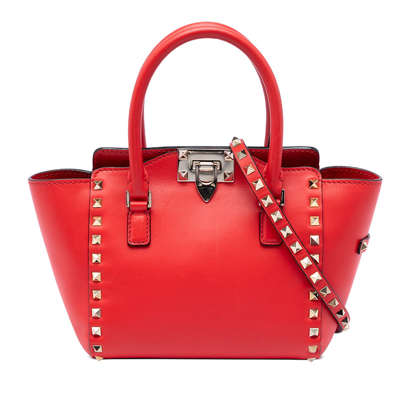 Valentino red leather mini Rockstud tote satchel: Valentino red leather mini Rockstud tote satchel This Valentino Mini Leather Rockstud Double Handle Tote showcases a studded leather design with rolled handles and a detachable flat leather shoulder s