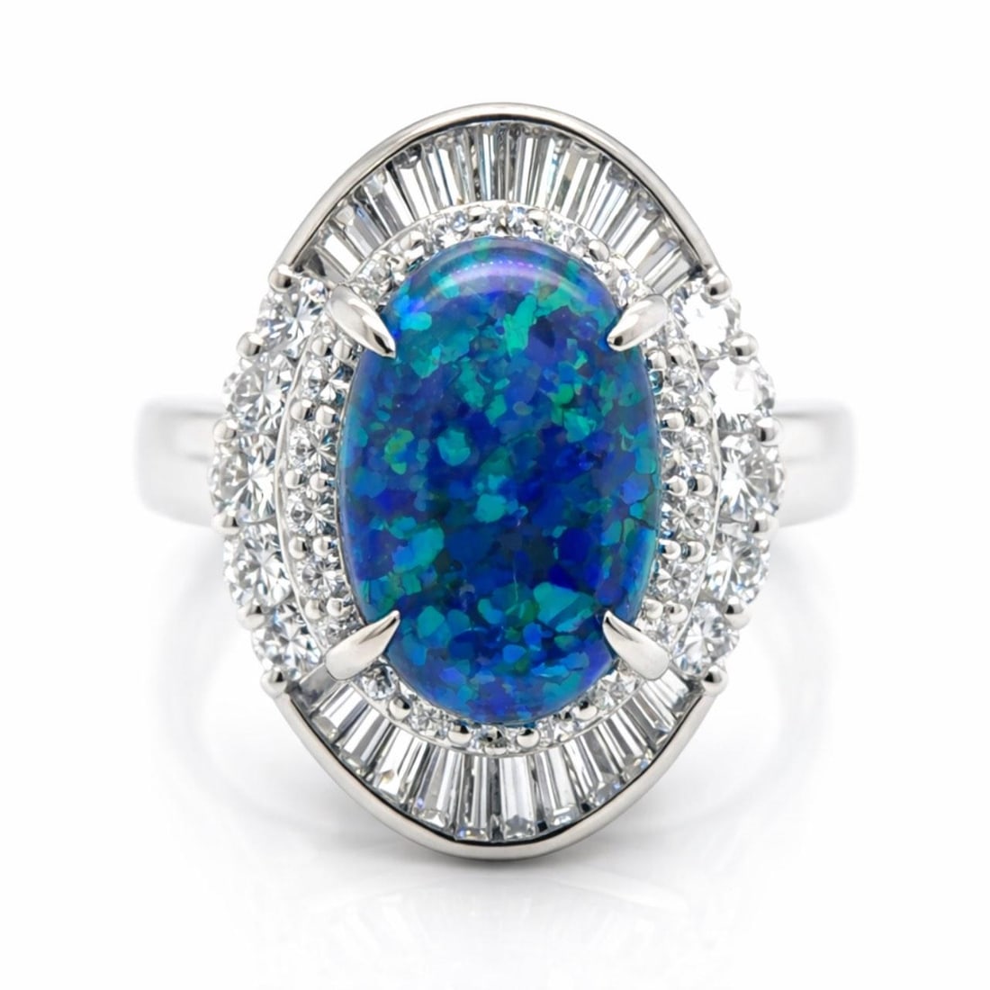 Opal and Diamond Platinum Ring with 2.49 Ct Center Stone: Opal and Diamond Platinum Ring with 2.49 Ct Center Stone This platinum ring features a 2.49 ct opal as the centerpiece, complemented by approximately 1.00 ct of diamonds with F-G color and VVS-VS clar