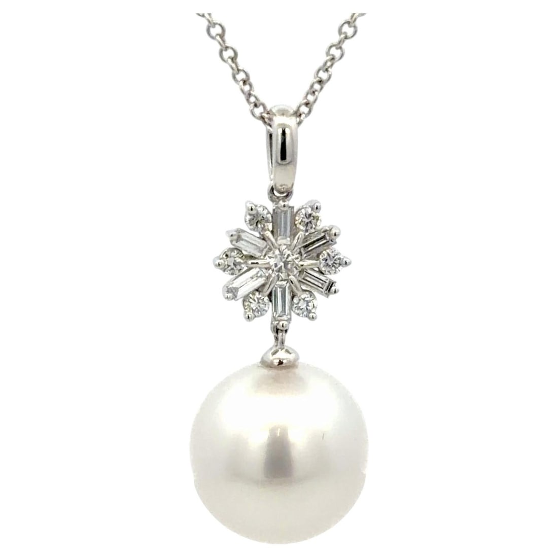 18K White Gold Italian Pearl Diamond Snowflake Pendant Necklace: 18K White Gold Italian Pearl Diamond Snowflake Pendant Necklace This Italian-made pendant necklace is crafted from 18k white gold and features a luminous 13mm South Sea pearl suspended below a snowfla