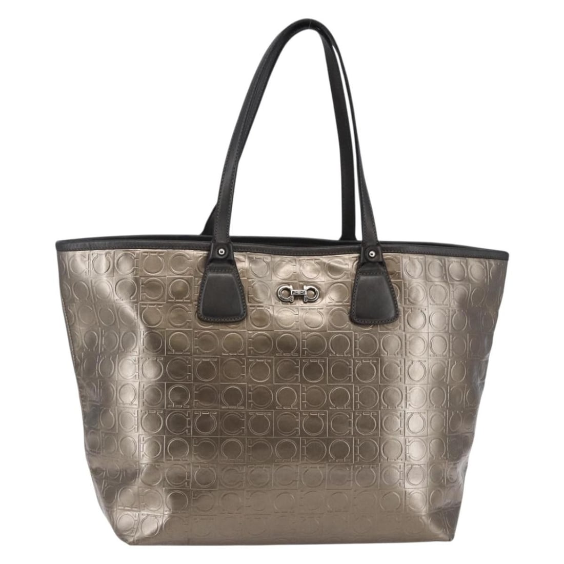 Gancini Tote by Salvatore Ferragamo Gold Patent Leather Handbag: Gancini Tote by Salvatore Ferragamo Gold Patent Leather Handbag This Salvatore Ferragamo Gancini Tote is crafted from gold patent leather and designed for women. The bag features a spacious interior a