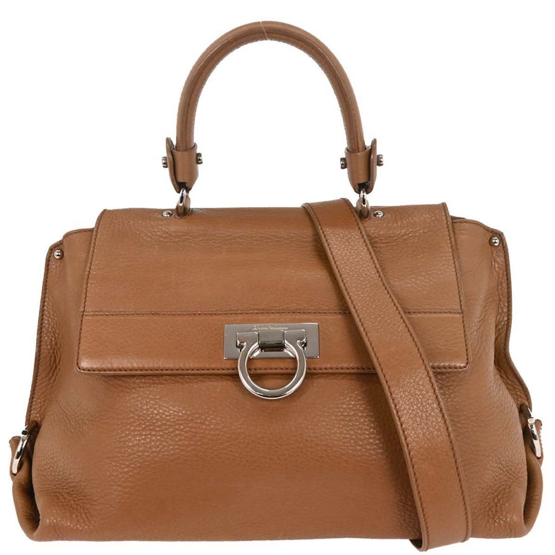 Brown Leather Sofia Satchel Bag by Salvatore Ferragamo: Brown Leather Sofia Satchel Bag by Salvatore Ferragamo This Salvatore Ferragamo Sofia Satchel is crafted from brown leather and designed for women. Made in Italy, it features a spacious interior and e