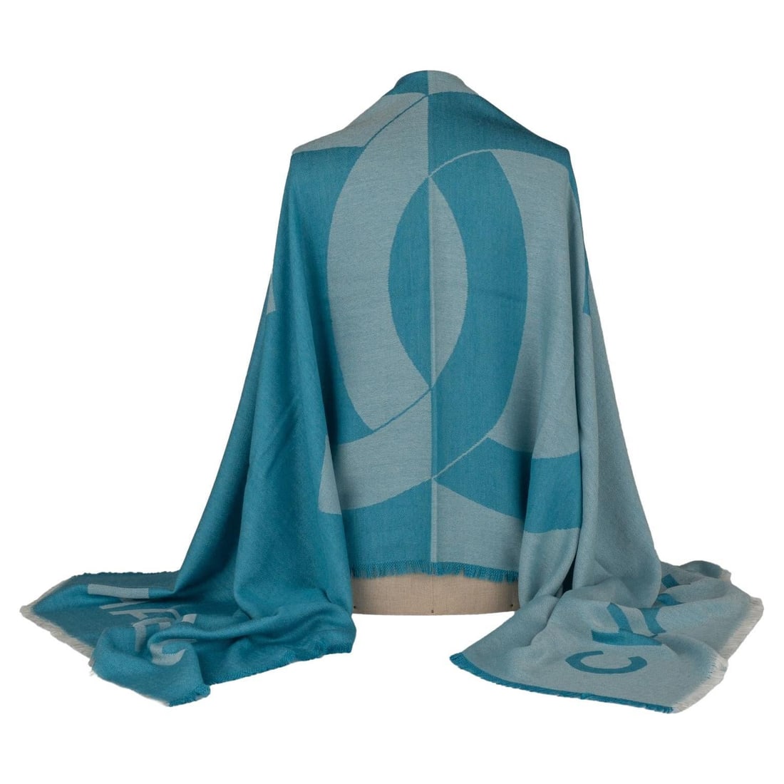Chanel Cashmere Shawl Turquoise CC Logo Made in Italy: Chanel Cashmere Shawl Turquoise CC Logo Made in Italy Elevate your style with this exquisite Chanel Cashmere Shawl in a stunning turquoise hue. This luxurious shawl features a prominent CC logo at its