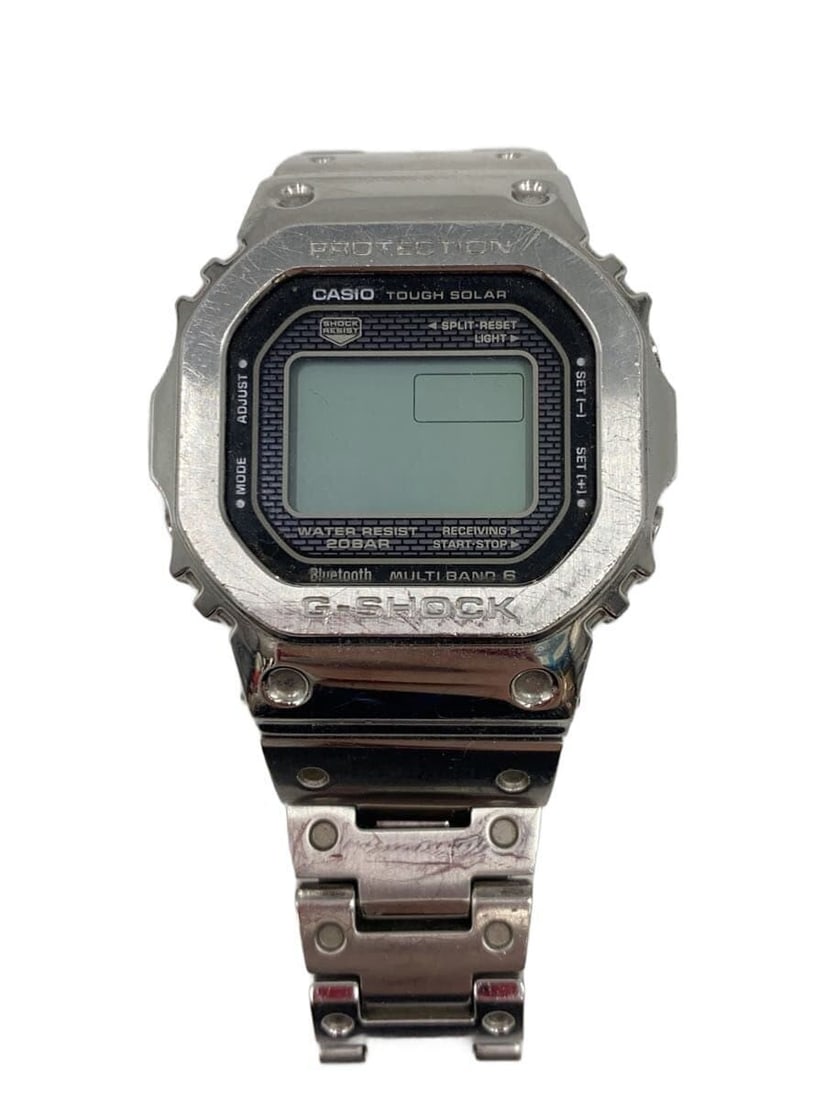 Casio G Shock GMW B5000 Silver Solar Men's Wristwatch: Casio G Shock GMW B5000 Silver Solar Men's Wristwatch This CASIO G-SHOCK Full Metal Silver Solar GMW-B5000 is a men's wristwatch crafted in Japan. The watch features a silver-tone case and band, with 