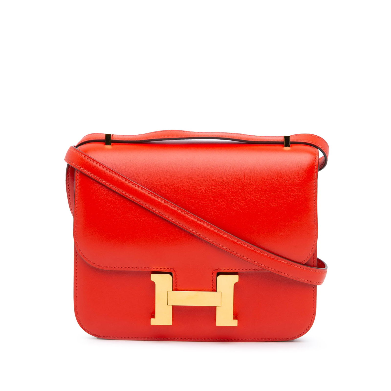 Hermes Mini Tadelakt Constance 18 Red Leather Shoulder Bag: Hermes Mini Tadelakt Constance 18 Red Leather Shoulder Bag The Hermes Mini Tadelakt Constance 18 is a luxurious red leather bag that showcases exquisite craftsmanship. It features a Tadelakt leather b