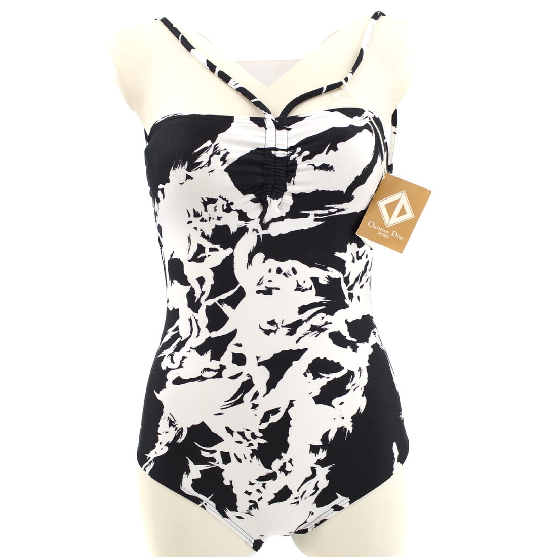 Black Halter Neck Swimdress by Christian Dior Size M Sleeveless: Black Halter Neck Swimdress by Christian Dior Size M Sleeveless This Christian Dior swimdress features a halter neck and sleeveless design in classic black. Made from a blend of nylon and polyurethane