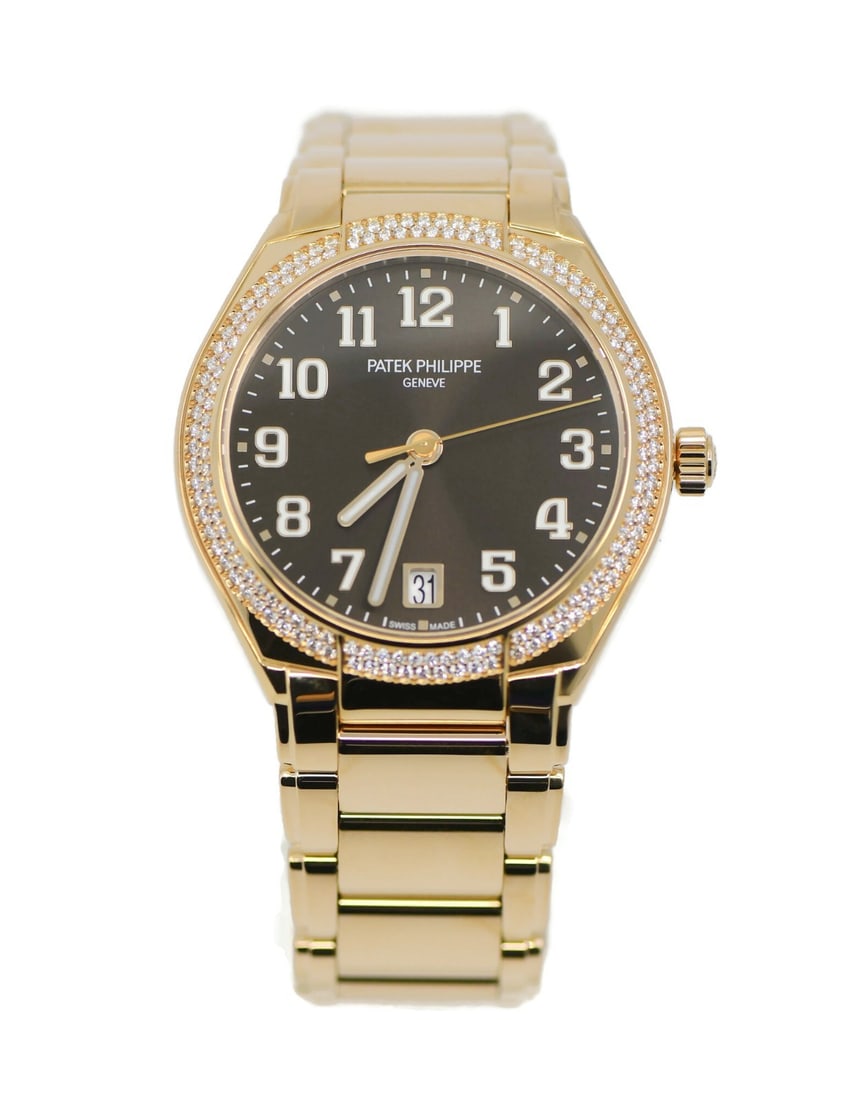 Patek Philippe Twenty 4 18K Rose Gold Diamond Bezel Wristwatch: Patek Philippe Twenty 4 18K Rose Gold Diamond Bezel Wristwatch This Patek Philippe Twenty-4 wristwatch showcases a luxurious 18K rose gold case and bracelet, complemented by a brown dial with Arabic n
