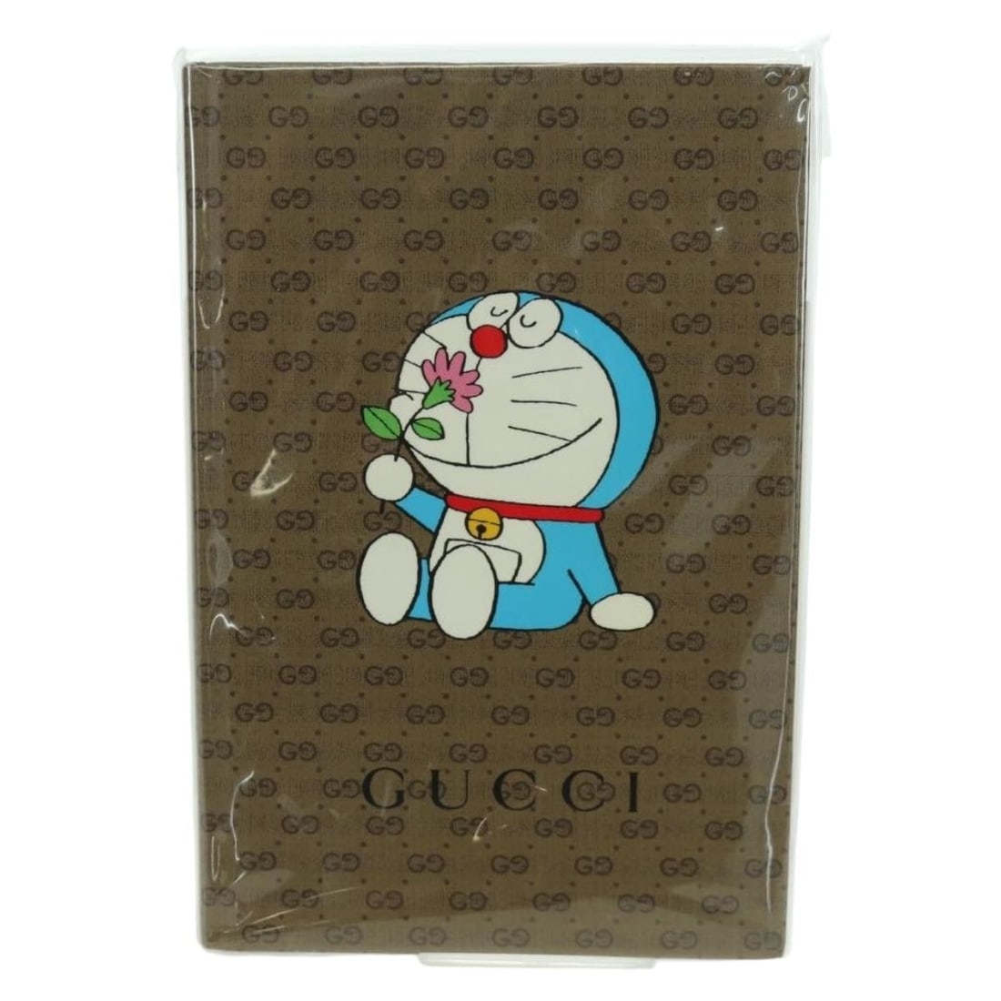 Doraemon Collaboration GG Supreme Beige Planner by Gucci PVC Leather: Doraemon Collaboration GG Supreme Beige Planner by Gucci PVC Leather This is a GUCCI GG Supreme notebook from the Doraemon collaboration, crafted from PVC leather in beige. Designed as a planner, it f