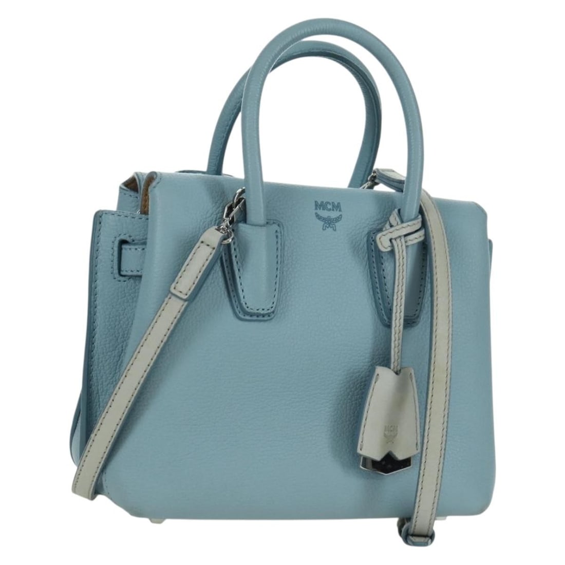 MCM Light Blue Leather Handbag with Shoulder Strap and Dust Bag: MCM Light Blue Leather Handbag with Shoulder Strap and Dust Bag This MCM handbag offers versatile 2-way carrying options and is crafted from light blue leather with silver-tone accents. Designed for w