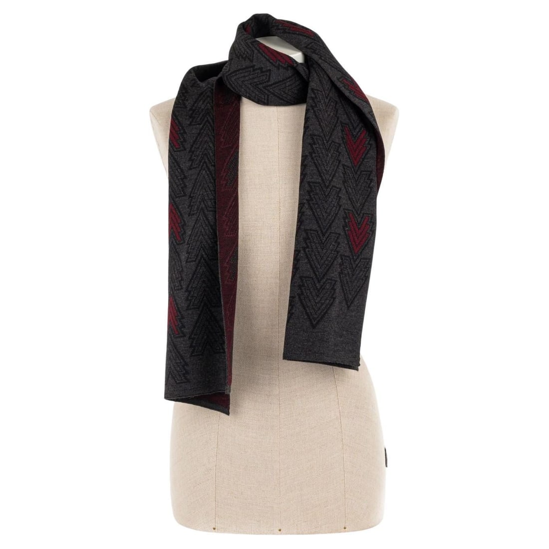 Louis Vuitton 2 Tone Wool Scarf with Heart Pattern: Louis Vuitton 2 Tone Wool Scarf with Heart Pattern Enhance your accessory collection with this luxurious Louis Vuitton wool scarf, featuring a charming hearts pattern. The scarf showcases a sophistica
