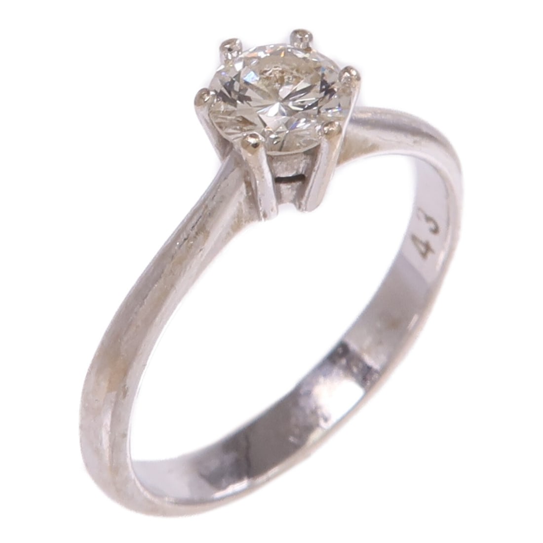 Diamond Women's Ring in 18K White Gold Size 5.75: Diamond Women's Ring in 18K White Gold Size 5.75 This women's ring features a diamond set in 18K white gold. It is designed in a classic style and is sized at US 5.75. The ring shows reasonable wear a