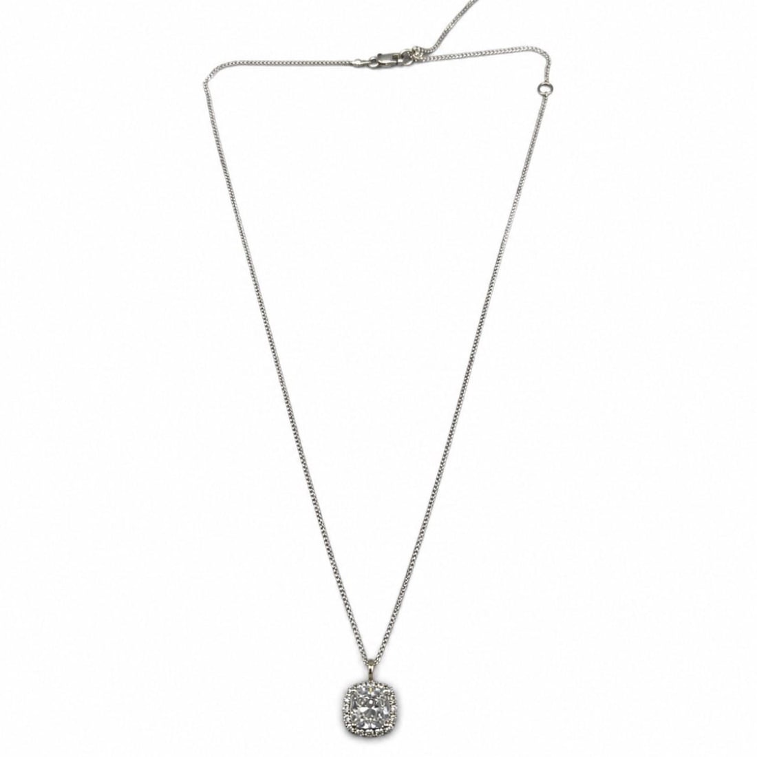 Platinum radiant diamond pendant with 14K white gold chain: Platinum radiant diamond pendant with 14K white gold chain This elegant pendant features a radiant-cut diamond set in platinum, weighing approximately 2.50 carats with F color and I1 clarity. It is co