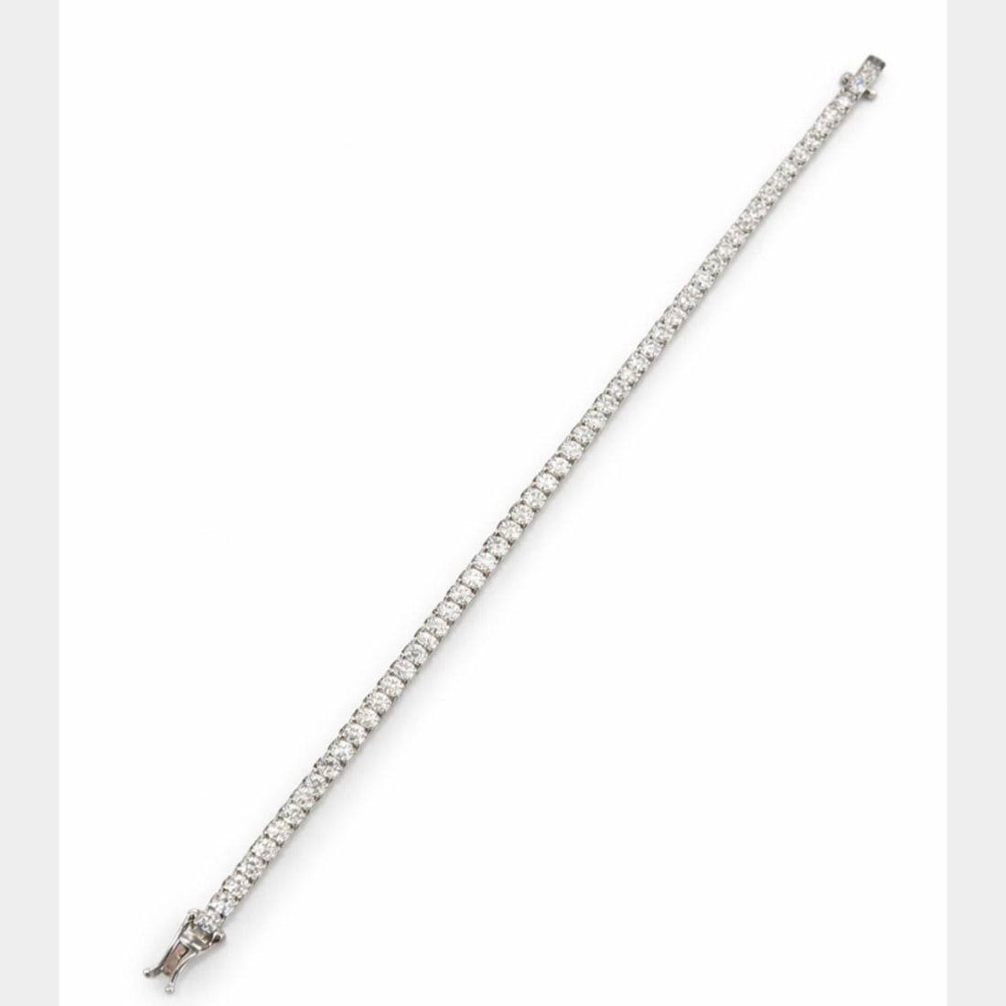 Diamond Tennis Bracelet in 14K White Gold 7.90 Carat 8 Inch: Diamond Tennis Bracelet in 14K White Gold 7.90 Carat 8 Inch This 14K white gold tennis bracelet features 57 diamonds with a total weight of approximately 7.90 carats. The diamonds are H-I color and VS