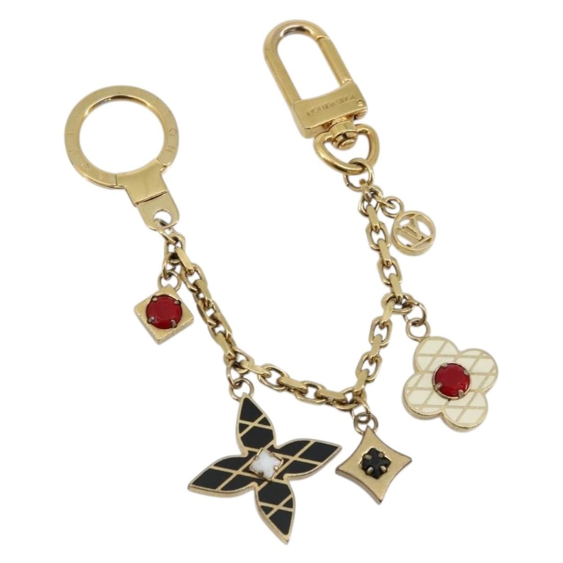 Louis Vuitton Maltage Flowers gold tone metal bag charm M67384: Louis Vuitton Maltage Flowers gold tone metal bag charm M67384 This Louis Vuitton Maltage Flowers bag charm features a gold tone metal construction and is designed for women. The accessory measures ap