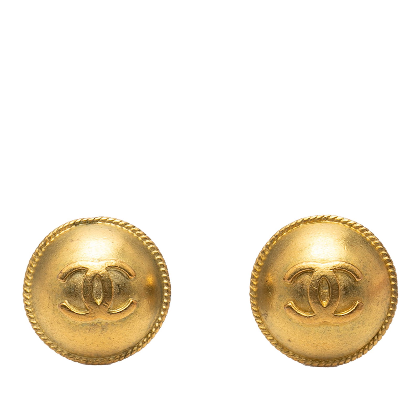 Chanel CC Gold Plated Round Clip On Earrings: Chanel CC Gold Plated Round Clip On Earrings These Chanel CC gold-plated round clip-on earrings feature a classic design with gold-plated metal bodies and secure back clip-on closures. Originating fro