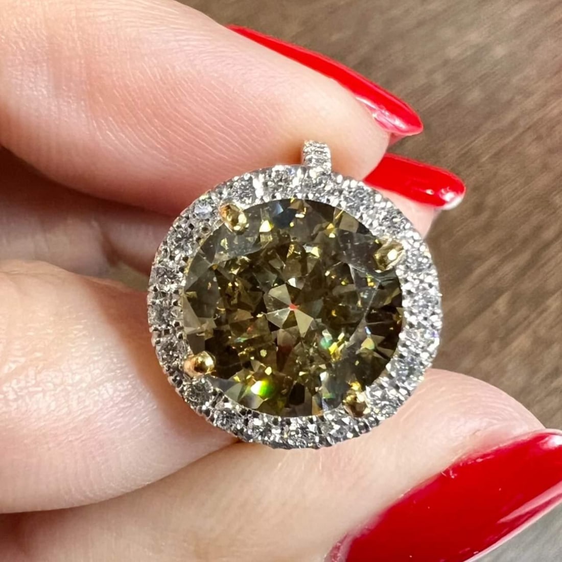 3.73 Ct GIA Certified Fancy Brownish Yellow Diamond Engagement Ring: 3.73 Ct GIA Certified Fancy Brownish Yellow Diamond Engagement Ring This exquisite engagement ring features a stunning 3.73 Ct GIA Certified Round Diamond at its center, showcasing a unique Fancy Brow
