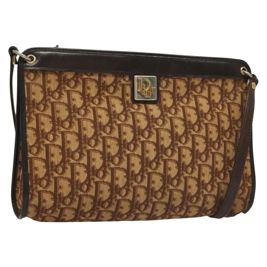 Vintage Canvas Shoulder Bag by Christian Dior Trotter Pattern: Vintage Canvas Shoulder Bag by Christian Dior Trotter Pattern This Christian Dior Vintage Trotter Shoulder Bag features a brown canvas exterior with leather accents. Designed for women, the bag shows 