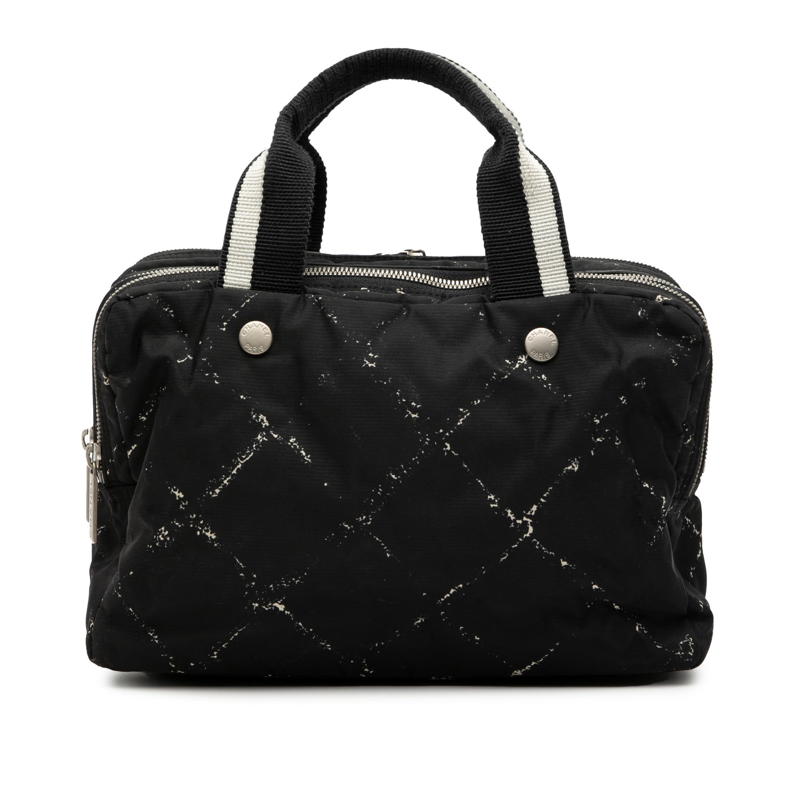 Chanel Black Nylon Old Travel Line Tote Bag with Top Zip: Chanel Black Nylon Old Travel Line Tote Bag with Top Zip This Chanel Old Travel Line handbag is crafted from black nylon fabric and features flat straps and a top zip closure. The bag shows signs of w