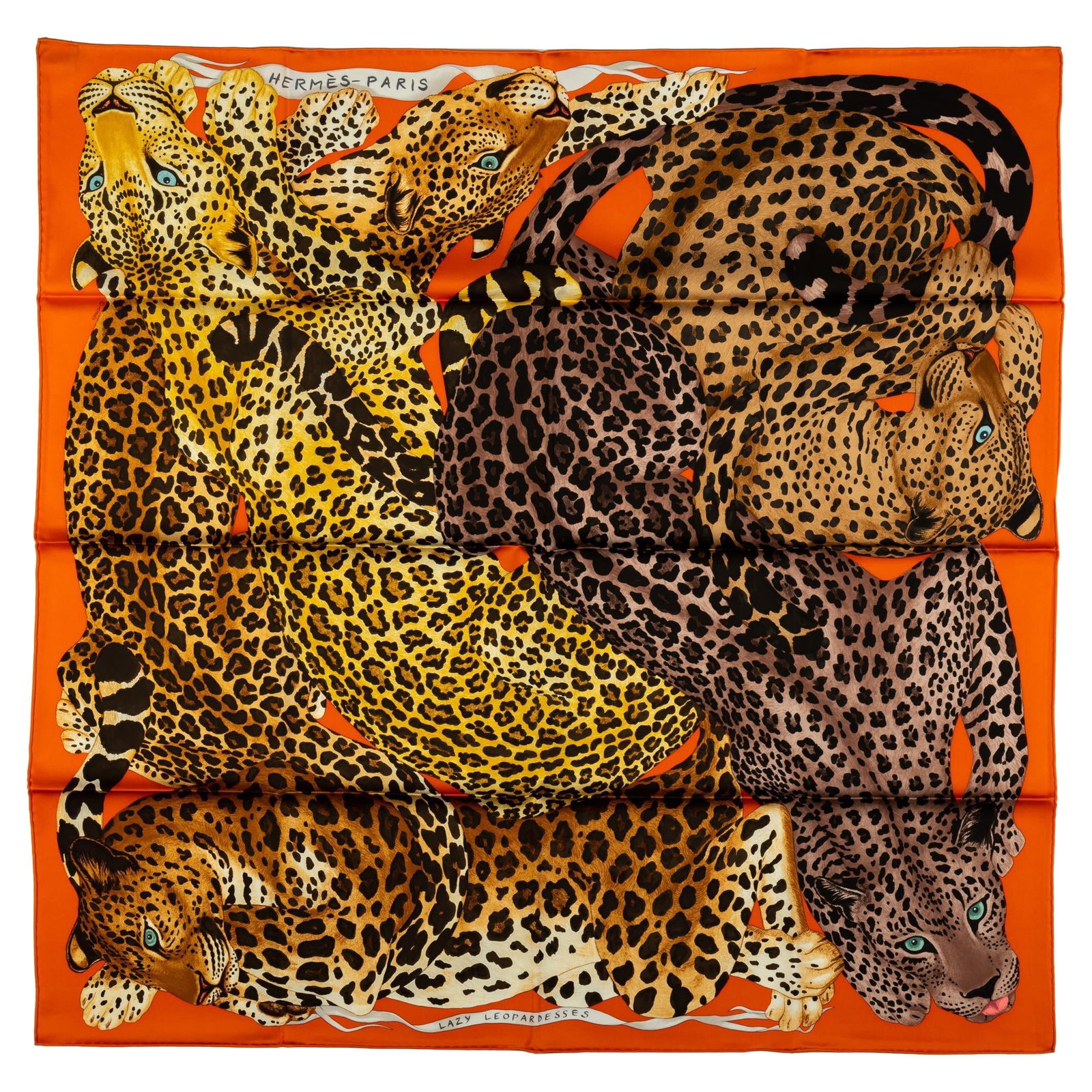 Hermes Lazy Leopardess Orange Silk Scarf with Box: Hermes Lazy Leopardess Orange Silk Scarf with Box Elevate your accessory collection with this exquisite Hermes Lazy Leopardess scarf. Crafted from luxurious silk, this vibrant orange scarf showcases a
