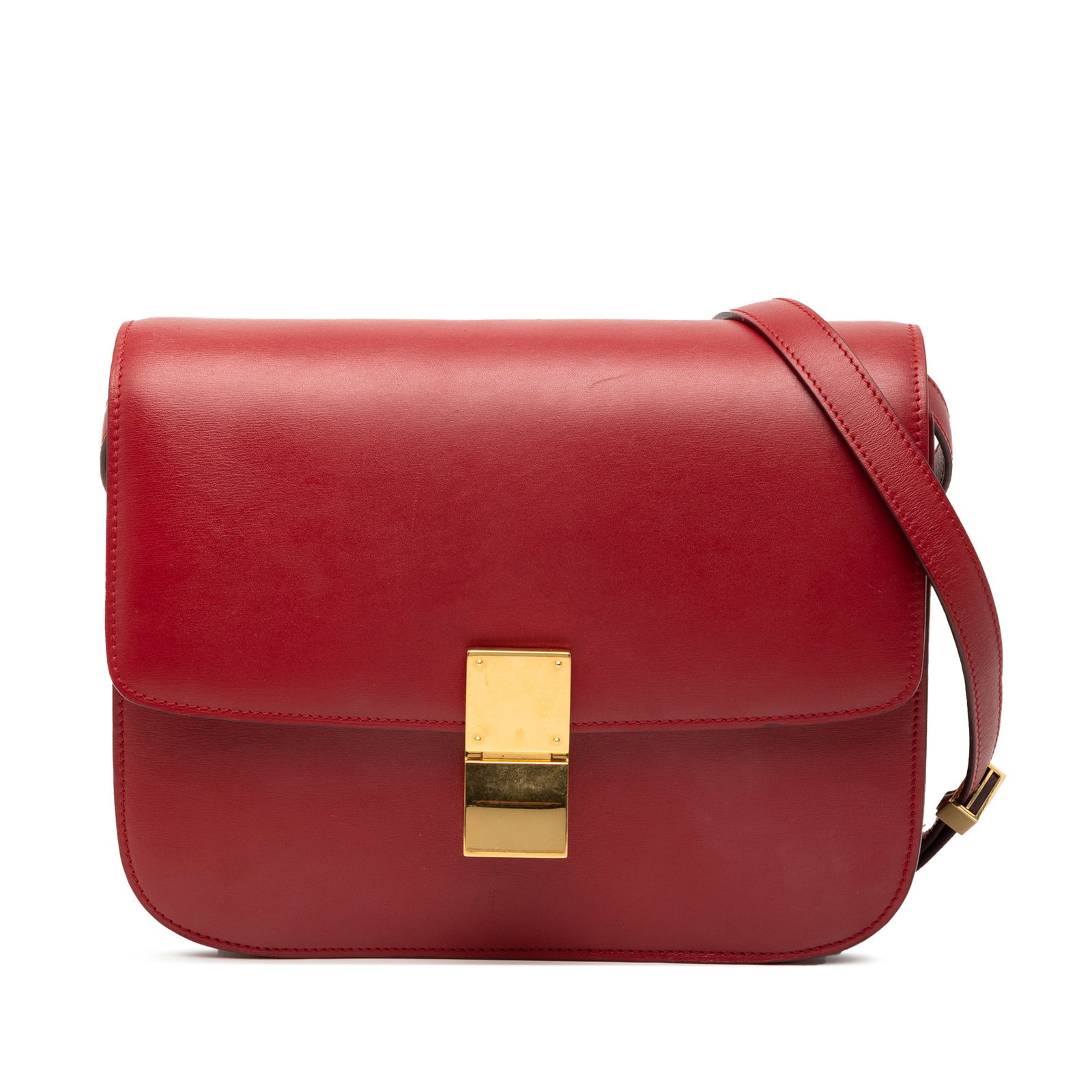 Celine Classic Box Medium Red Leather Crossbody Bag with Flap Clasp: Celine Classic Box Medium Red Leather Crossbody Bag with Flap Clasp This Celine Medium Calfskin Classic Box crossbody bag features a red leather body with an adjustable flat leather strap, a front fla