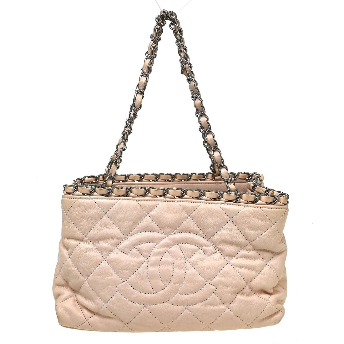 CHANEL Quilted Pink Lambskin Medium Tote Handbag: CHANEL Quilted Pink Lambskin Medium Tote Handbag This Chanel Pink Calfskin Luxury Line Tote Handbag features a quilted design with double handles and a magnetic closure. Crafted from pink lambskin lea