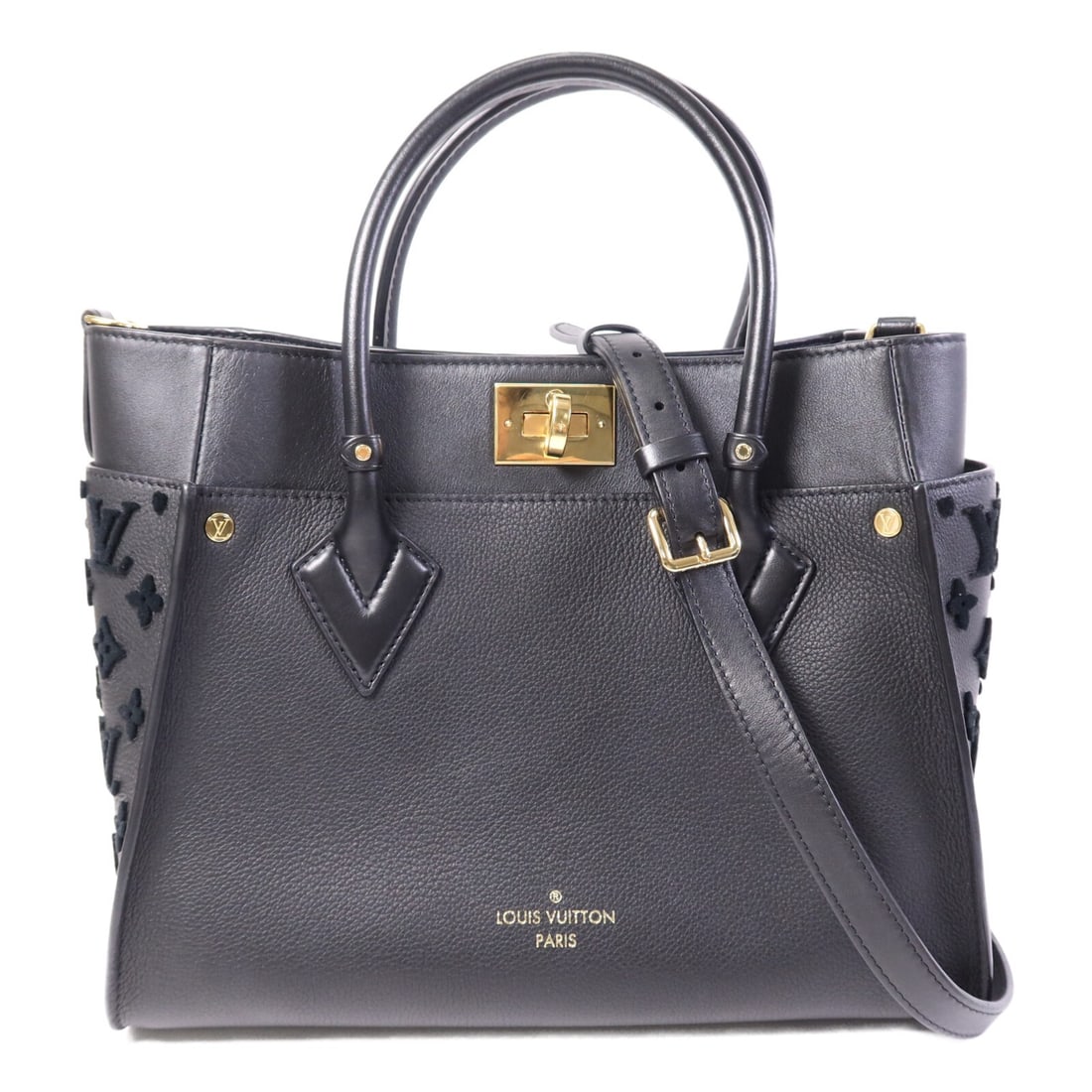 Louis Vuitton On My Side MM Black Calfskin Two Way Shoulder Bag: Louis Vuitton On My Side MM Black Calfskin Two Way Shoulder Bag This Louis Vuitton On My Side MM 2-way shoulder bag features a sleek black design crafted from PVC coated canvas. Designed for women, it