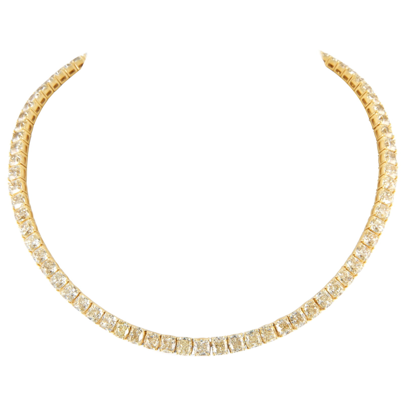 53.99ct Yellow Diamond Tennis Necklace 18k Gold: 53.99ct Yellow Diamond Tennis Necklace 18k Gold This stunning tennis necklace features a total weight of 53.99 carats of exquisite natural cushion-cut yellow diamonds, prong set in luxurious 18k yello