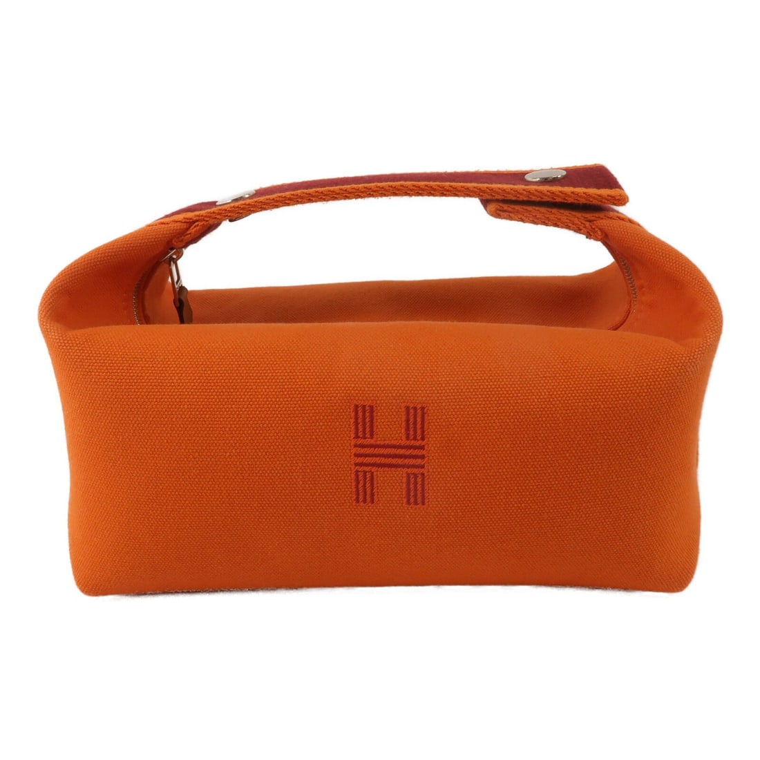 Hermes Bride A Brac PM Orange Canvas Handbag: Hermes Bride A Brac PM Orange Canvas Handbag This HERMES Bride A Brac PM handbag features a vibrant orange canvas exterior and is designed for women. The bag offers a compact silhouette with practical