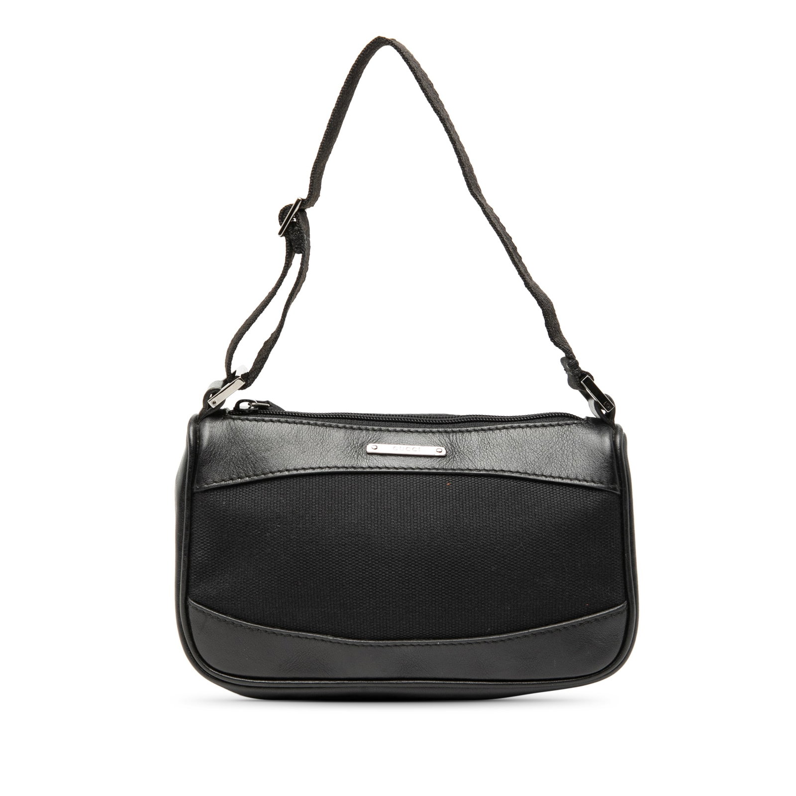 Gucci Canvas Shoulder Bag with Leather Accents Adjustable Strap: Gucci Canvas Shoulder Bag with Leather Accents Adjustable Strap This Gucci shoulder bag features a canvas body with leather trim, an adjustable flat strap, and a top zip closure. The bag is crafted in
