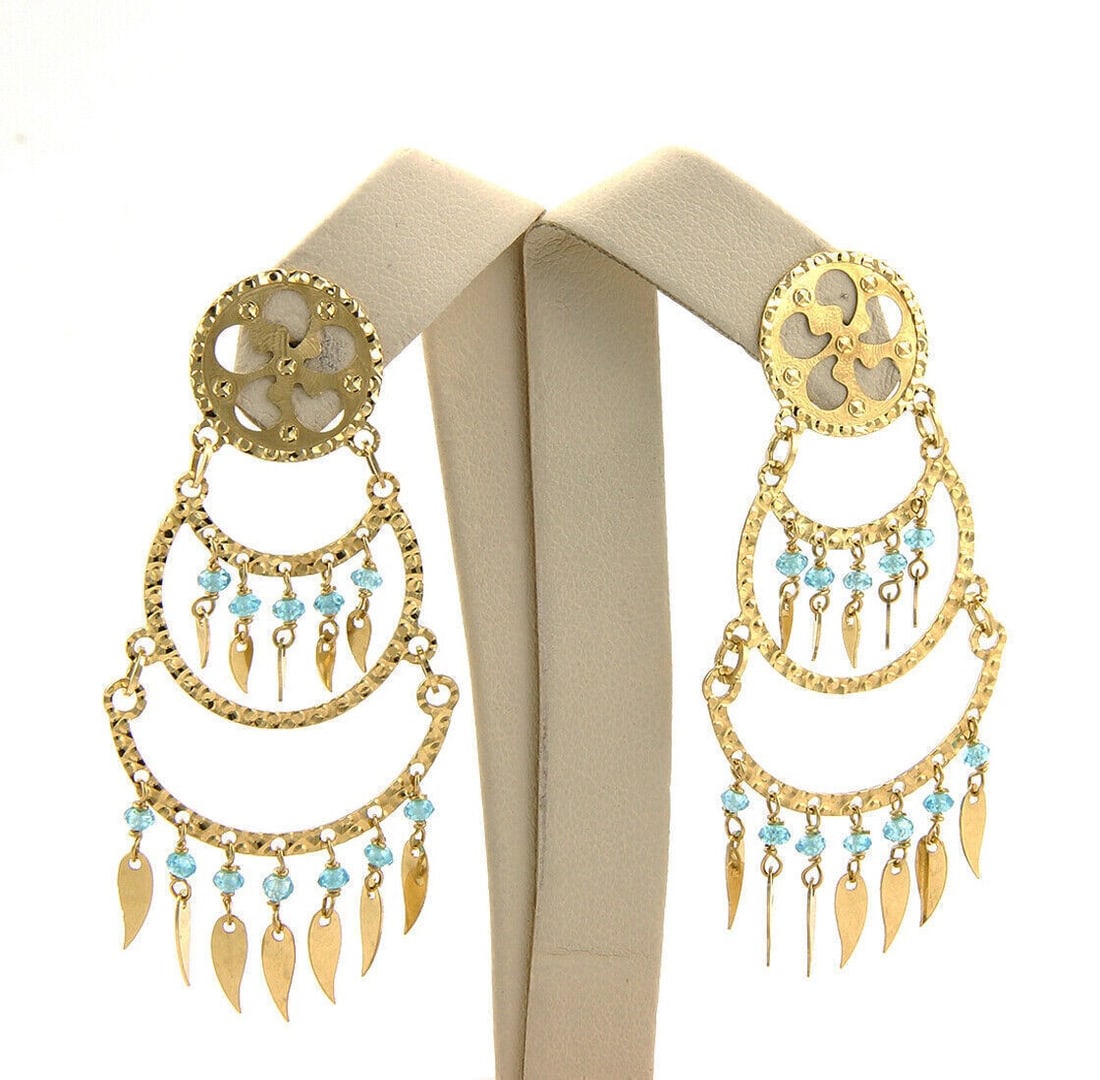 Sun Day 18k Yellow Gold Aquamarine Chandelier Earrings: Sun Day 18k Yellow Gold Aquamarine Chandelier Earrings These Sun Day chandelier earrings are crafted from 18k yellow gold and feature a striking three-tier dangle design. Each earring is adorned with 