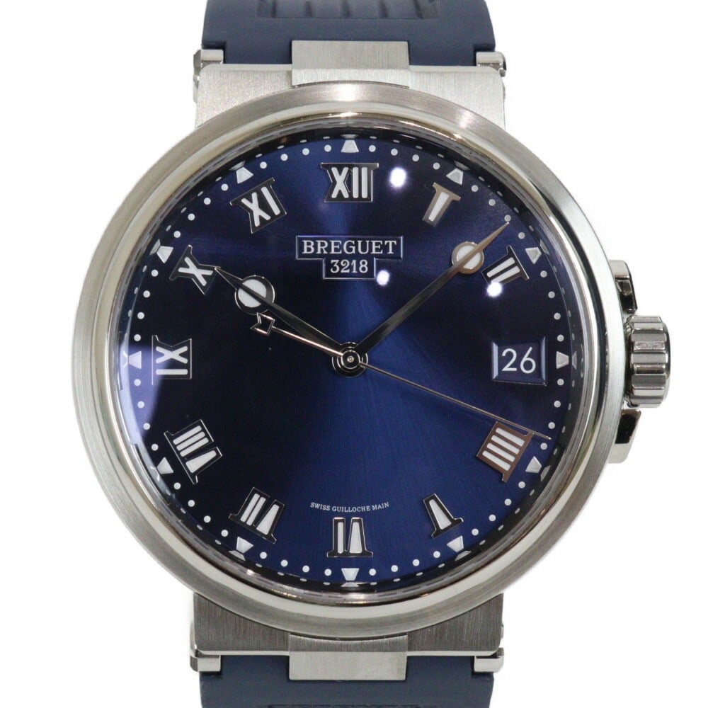 Breguet Marine 5517 Titanium Automatic Date Watch: Breguet Marine 5517 Titanium Automatic Date Watch This Breguet Marine 5517 men's wristwatch features a titanium case paired with a blue dial and a durable rubber strap. The watch is powered by an auto