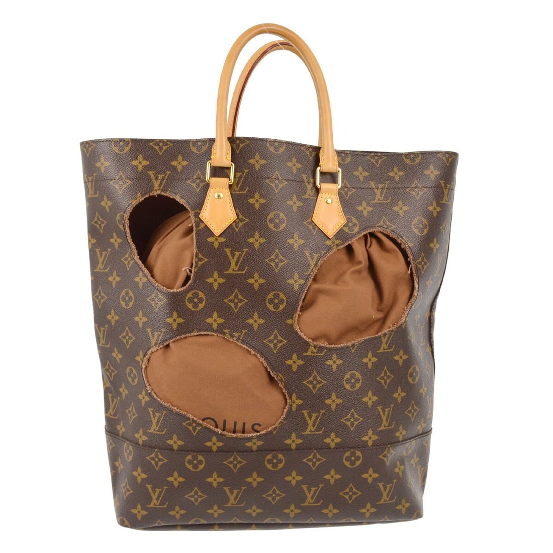 Louis Vuitton Monogram Bag With Holes Limited Edition Tote: Louis Vuitton Monogram Bag With Holes Limited Edition Tote This Louis Vuitton "Bag With Holes" tote bag is a limited edition collaboration with Comme des Garcons. Crafted in France from the brand's si