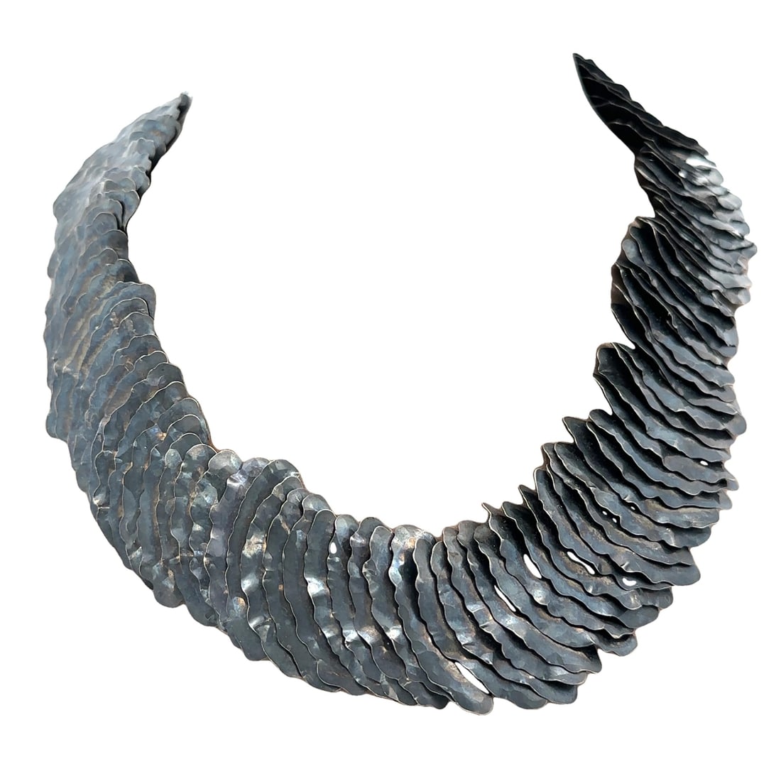 Hilde Van Der Heyden Sterling Silver Modernist Blackened Necklace: Hilde Van Der Heyden Sterling Silver Modernist Blackened Necklace This exquisite necklace, designed by Hilde Van Der Heyden, showcases a modernist aesthetic with a flowy design. Crafted from pure ster