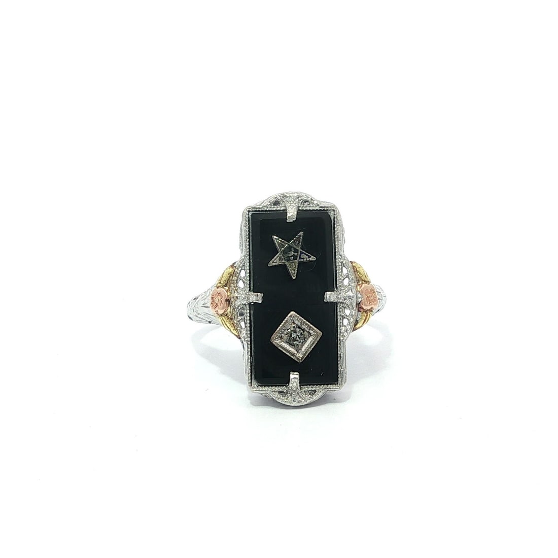 Antique Art Deco White Gold Onyx Diamond Masonic Floral Ring: Antique Art Deco White Gold Onyx Diamond Masonic Floral Ring This exquisite Antique Art Deco ring features a stunning combination of materials and intricate design. Crafted from 9-18k white gold and a