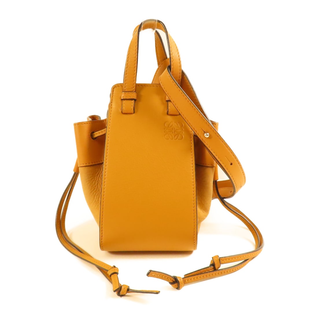 LOEWE Hammock Mini Brown Calfskin 2Way Shoulder Bag: LOEWE Hammock Mini Brown Calfskin 2Way Shoulder Bag This LOEWE Hammock Mini 2Way Shoulder Bag is crafted from high-quality brown calfskin leather. Featuring a versatile design, it can be carried as bo