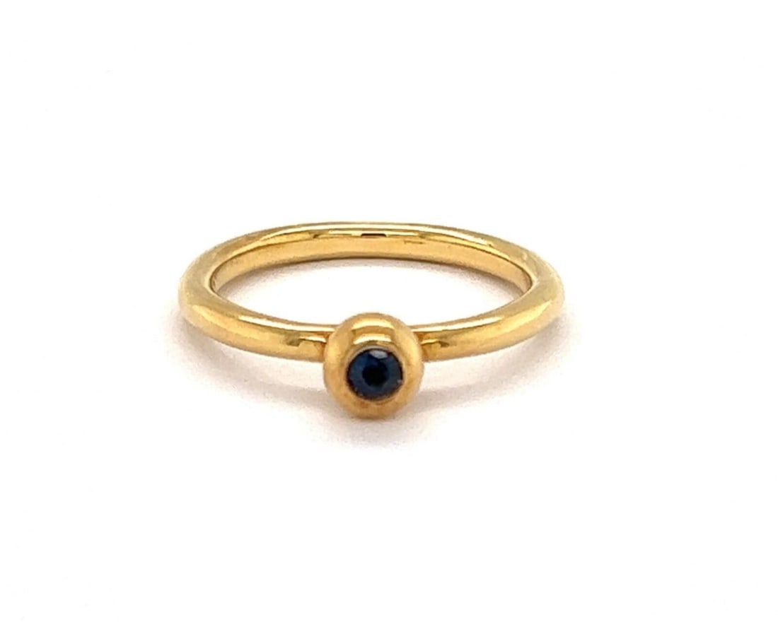 Paloma Picasso Tiffany sapphire ring 18k yellow gold size 6: Paloma Picasso Tiffany sapphire ring 18k yellow gold size 6 This authentic Tiffany & Co. ring, designed by Paloma Picasso, features a vivid blue sapphire set in solid 18k yellow gold. The minimalist, 
