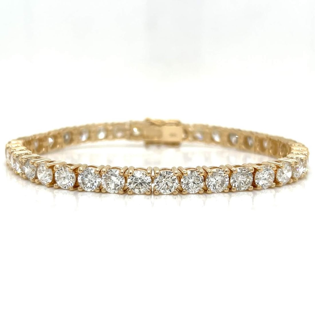 14K Yellow Gold Diamond Tennis Bracelet 19.60 Ct 37 Diamonds I-J SI1-I1: 14K Yellow Gold Diamond Tennis Bracelet 19.60 Ct 37 Diamonds I-J SI1-I1 This exquisite 14K Yellow Gold Tennis Bracelet showcases a stunning array of 37 diamonds, with a total weight of approximately 1