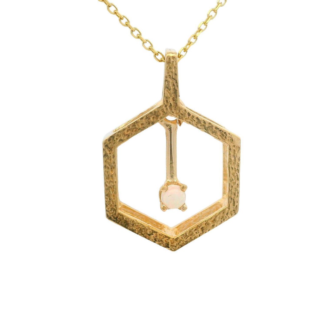 14k Yellow Gold Hexagonal Pendant with Opal Dangle Necklace: 14k Yellow Gold Hexagonal Pendant with Opal Dangle Necklace This exquisite necklace features a stunning open hexagonal pendant crafted from solid 14k yellow gold, showcasing a textured finish that add