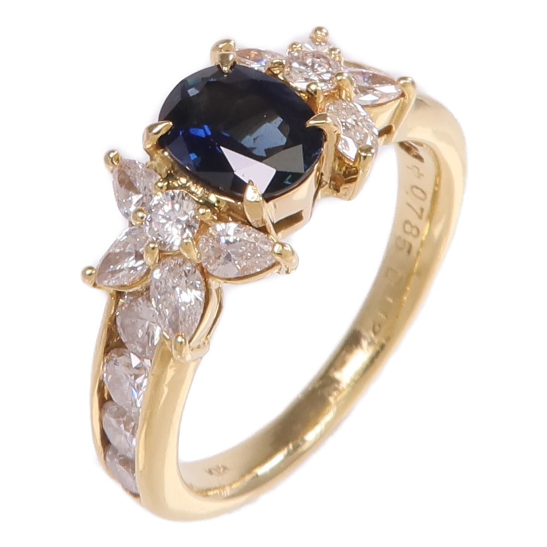 Sapphire and Diamond Women's Ring in 18K Yellow Gold Size 6.25: Sapphire and Diamond Women's Ring in 18K Yellow Gold Size 6.25 This women's ring features a blue sapphire as the main stone, set in 18K yellow gold. Designed in a regular size 6.25, it is crafted with