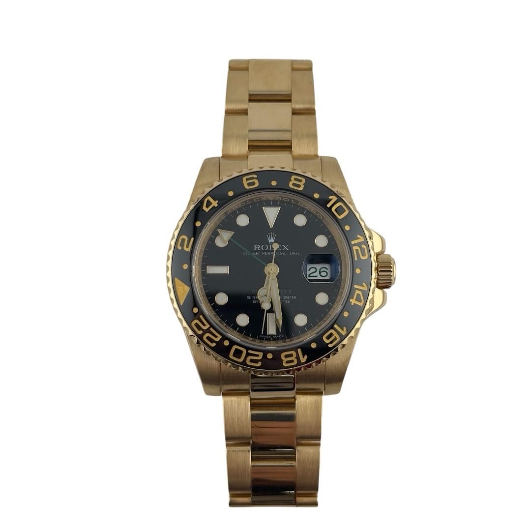 Rolex 116718LN GMT-Master II Black Dial Oyster Bracelet with Card 2008: Rolex 116718LN GMT-Master II Black Dial Oyster Bracelet with Card 2008 This Rolex GMT-Master II features a black dial and a ceramic bezel, complemented by an Oyster bracelet. The watch is identified b